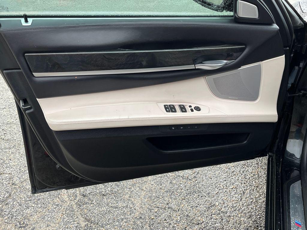 used 2015 BMW 750 car, priced at $11,985