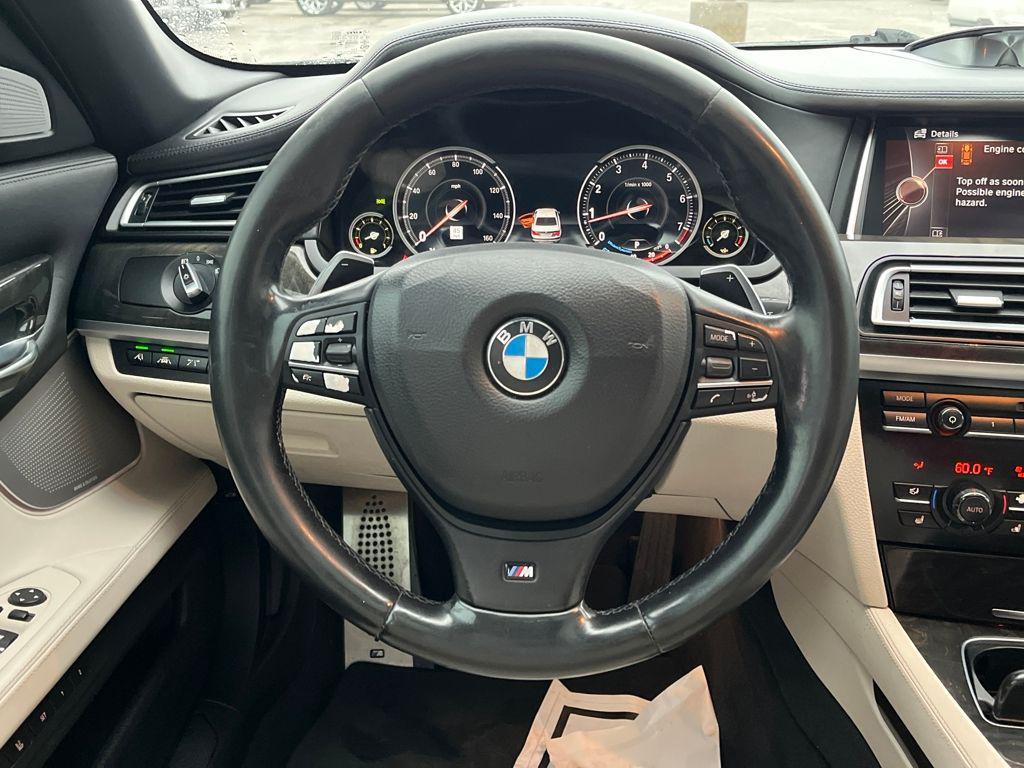 used 2015 BMW 750 car, priced at $11,985