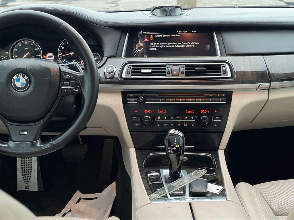 used 2015 BMW 750 car, priced at $11,985