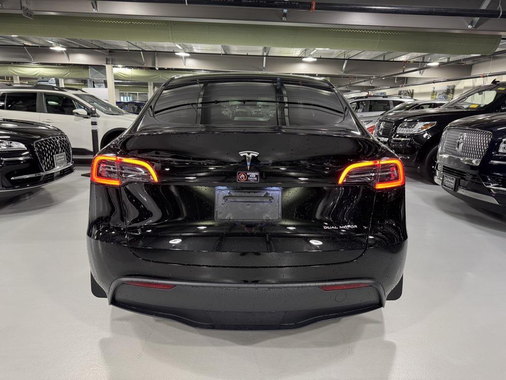 used 2025 Tesla Model Y car, priced at $32,300