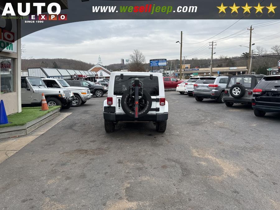 used 2014 Jeep Wrangler Unlimited car, priced at $16,995