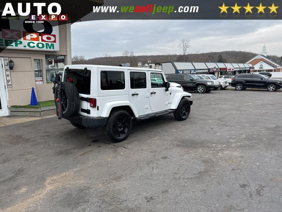 used 2014 Jeep Wrangler Unlimited car, priced at $18,995