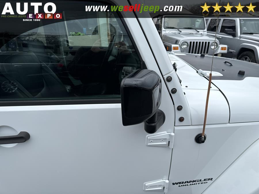 used 2014 Jeep Wrangler Unlimited car, priced at $16,995