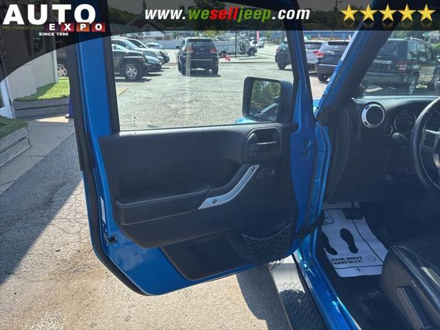 used 2014 Jeep Wrangler Unlimited car, priced at $16,995