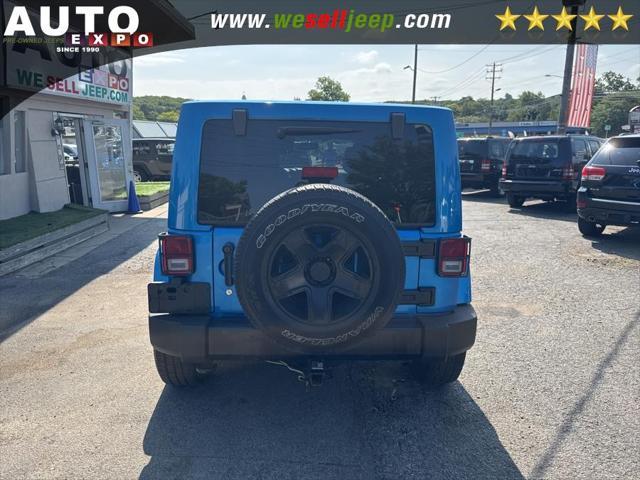 used 2014 Jeep Wrangler Unlimited car, priced at $16,995
