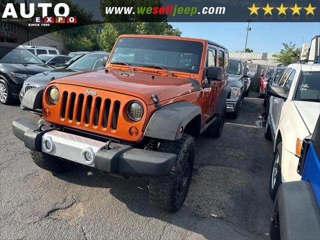 used 2011 Jeep Wrangler Unlimited car, priced at $13,995