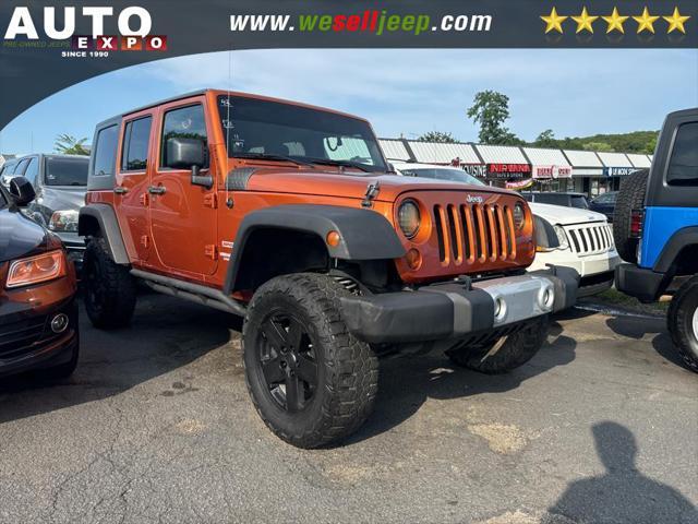 used 2011 Jeep Wrangler Unlimited car, priced at $13,995