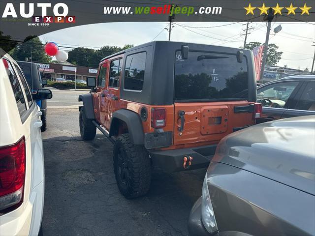 used 2011 Jeep Wrangler Unlimited car, priced at $13,995