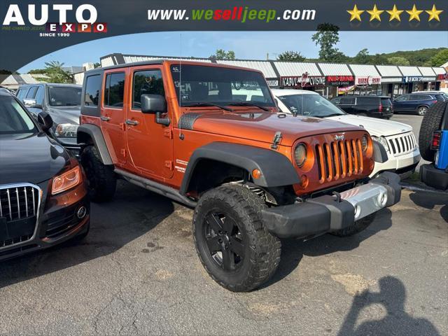 used 2011 Jeep Wrangler Unlimited car, priced at $13,995