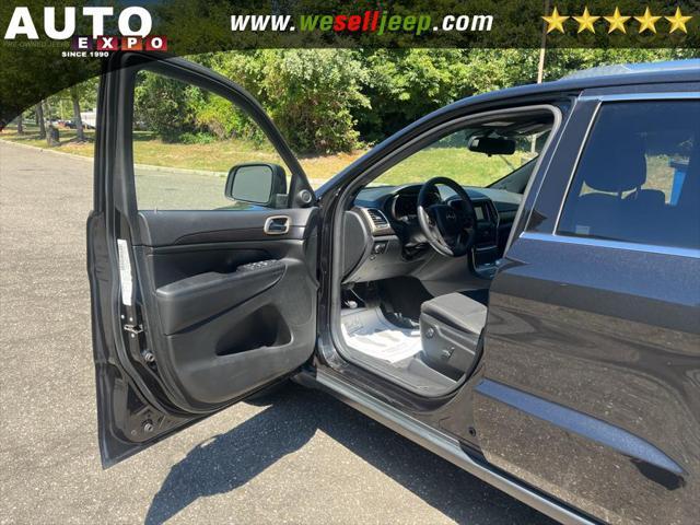 used 2014 Jeep Grand Cherokee car, priced at $11,295