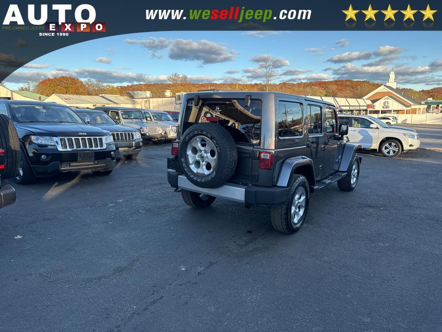 used 2014 Jeep Wrangler Unlimited car, priced at $14,995