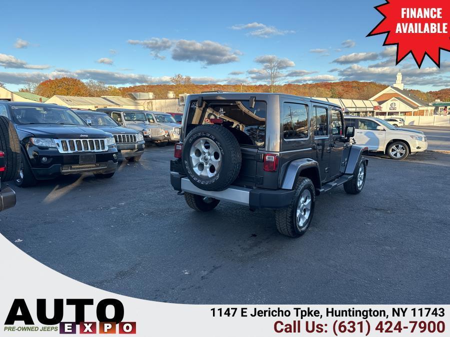 used 2014 Jeep Wrangler Unlimited car, priced at $14,995
