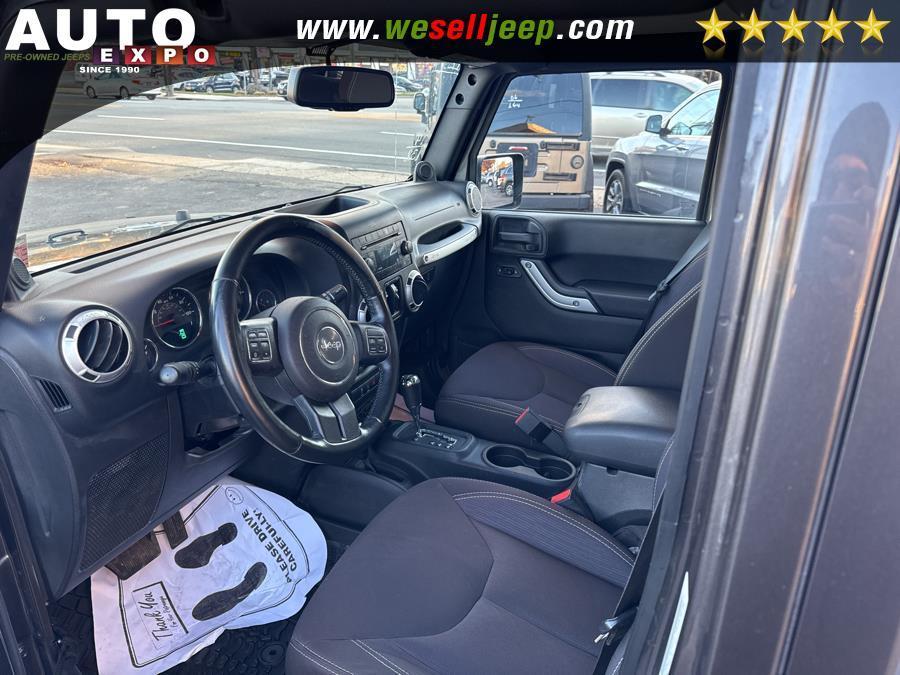 used 2014 Jeep Wrangler Unlimited car, priced at $14,995