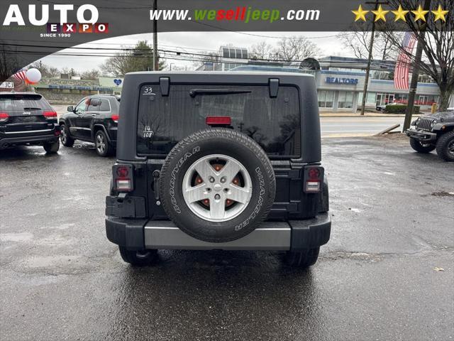 used 2014 Jeep Wrangler car, priced at $13,995
