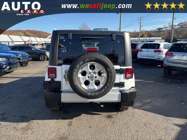 used 2014 Jeep Wrangler car, priced at $12,995