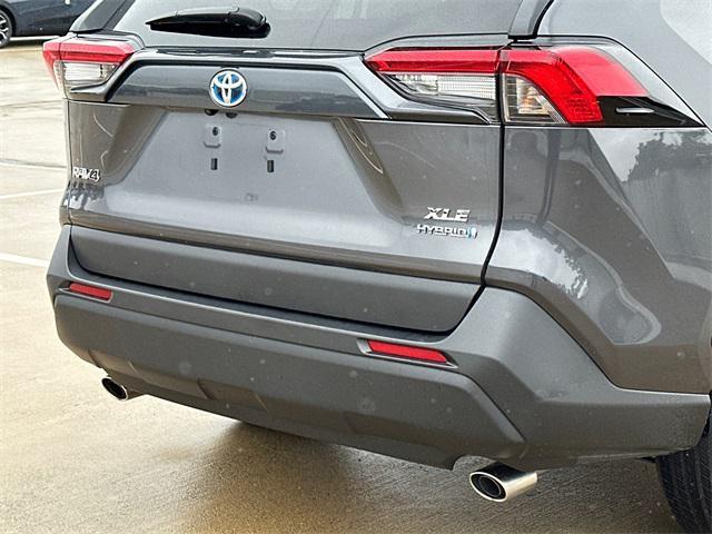 used 2024 Toyota RAV4 Hybrid car, priced at $33,960