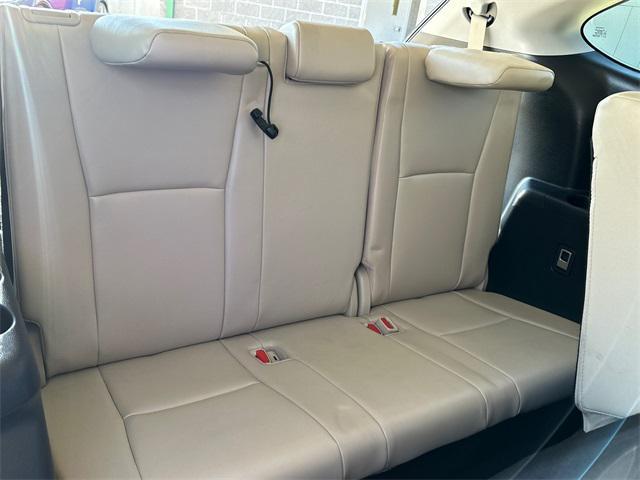 used 2021 Toyota Highlander Hybrid car, priced at $38,610