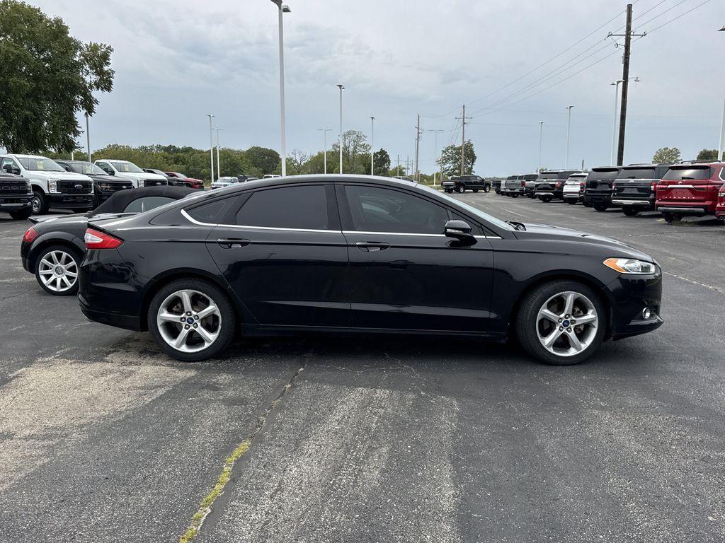 used 2014 Ford Fusion car, priced at $6,000