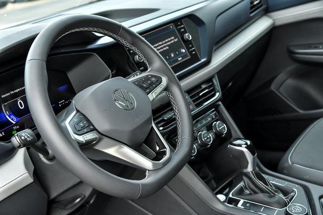 new 2024 Volkswagen Taos car, priced at $33,611