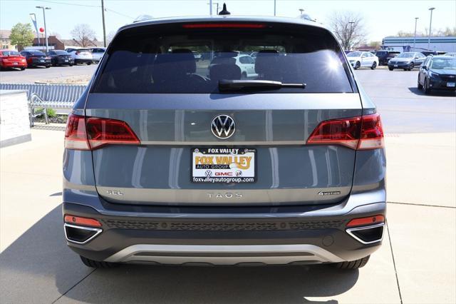 used 2023 Volkswagen Taos car, priced at $30,490