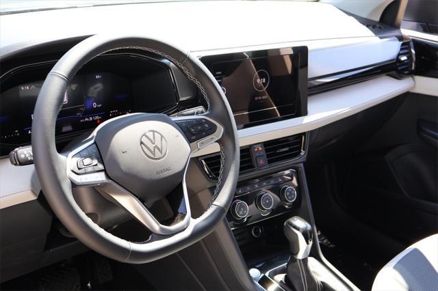 new 2025 Volkswagen Taos car, priced at $27,499