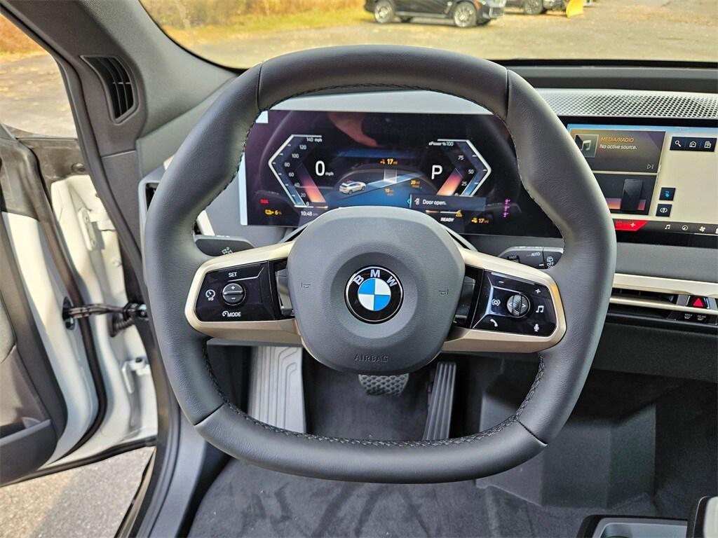 new 2026 BMW iX car, priced at $97,495