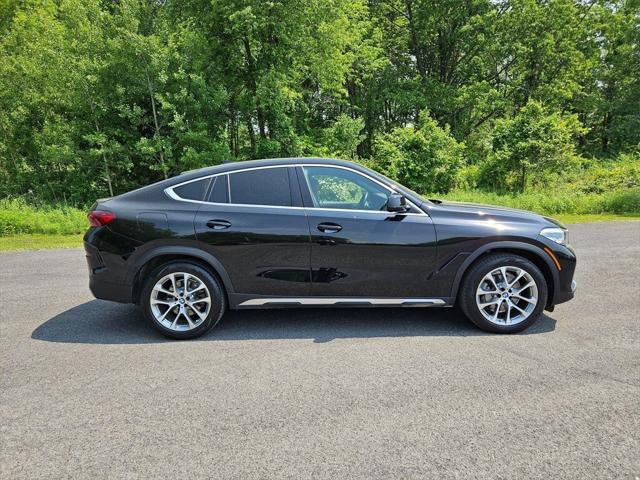 used 2022 BMW X6 car, priced at $52,050