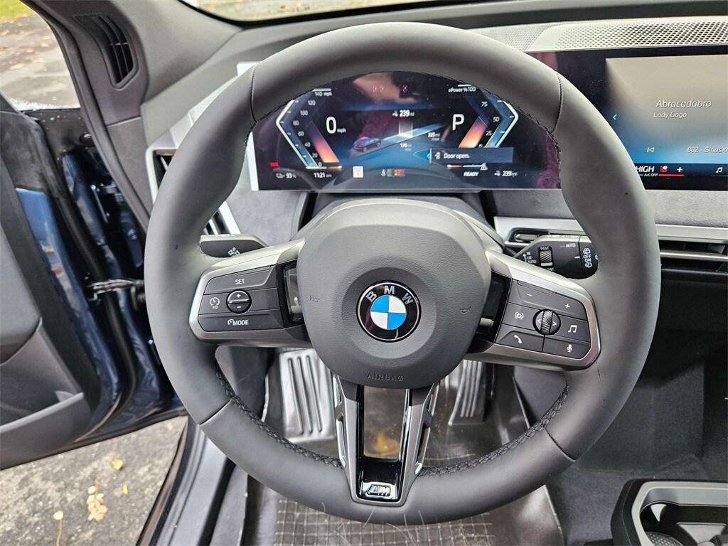 new 2026 BMW iX car, priced at $90,695