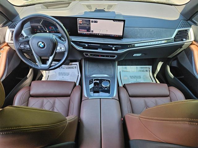 used 2024 BMW X5 car, priced at $58,704