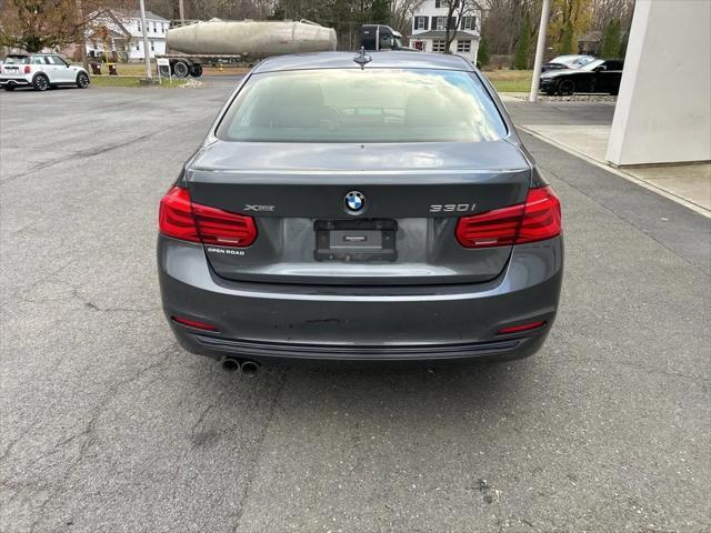 used 2018 BMW 330 car, priced at $20,547