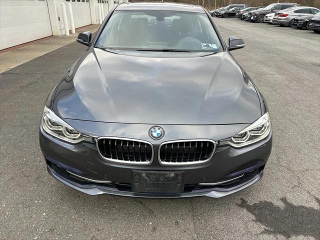 used 2018 BMW 330 car, priced at $20,547