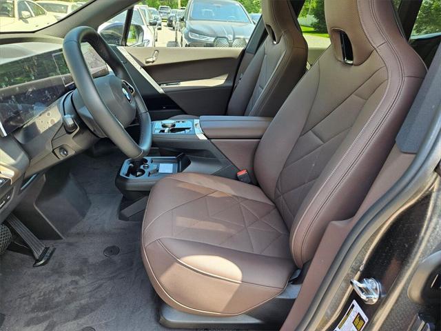 new 2026 BMW iX car, priced at $86,595