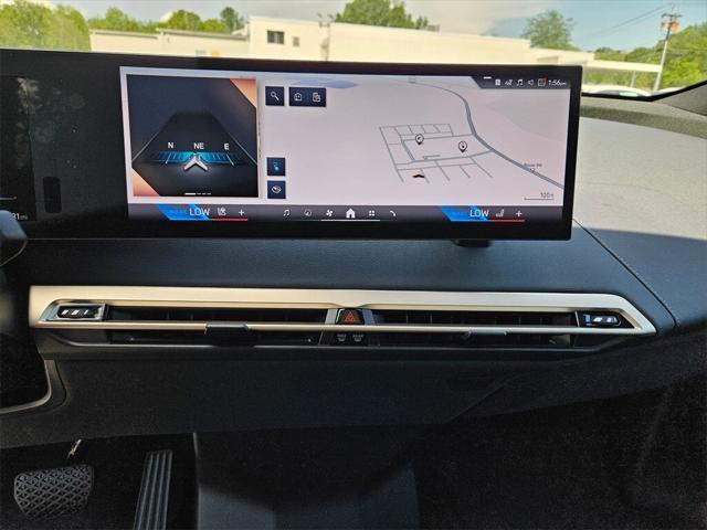 new 2026 BMW iX car, priced at $86,595