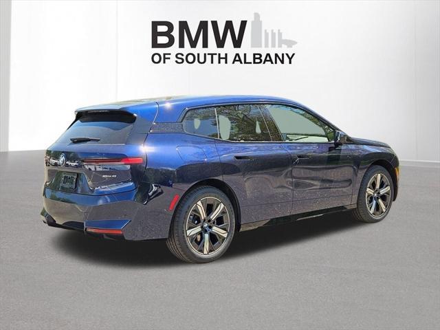 new 2026 BMW iX car, priced at $86,595