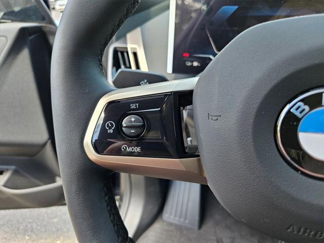 new 2026 BMW iX car, priced at $86,595
