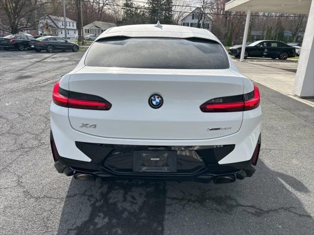 used 2023 BMW X4 car, priced at $43,159