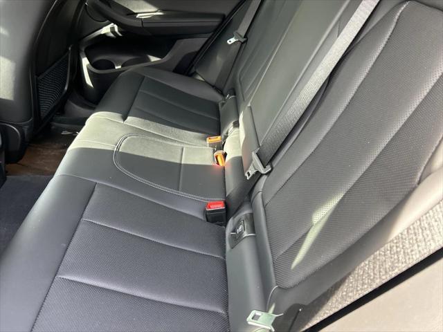 used 2023 BMW X4 car, priced at $43,159
