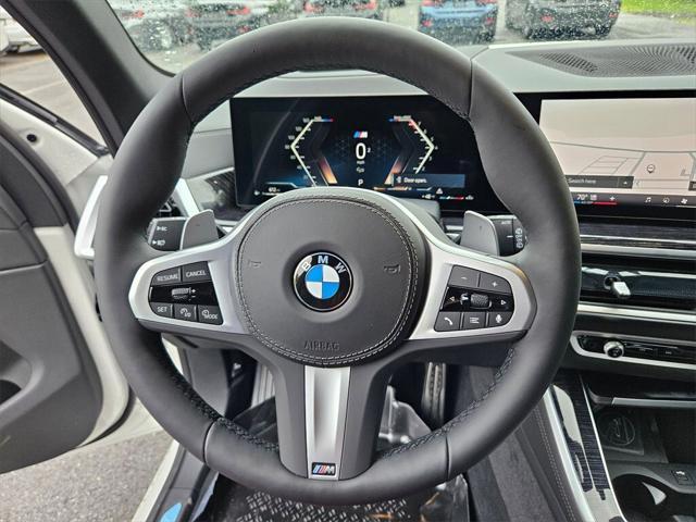 new 2026 BMW X5 car, priced at $77,875