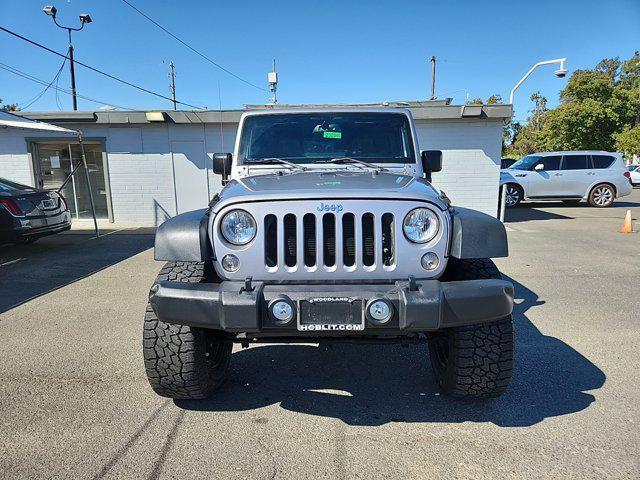 used 2018 Jeep Wrangler JK Unlimited car, priced at $23,998