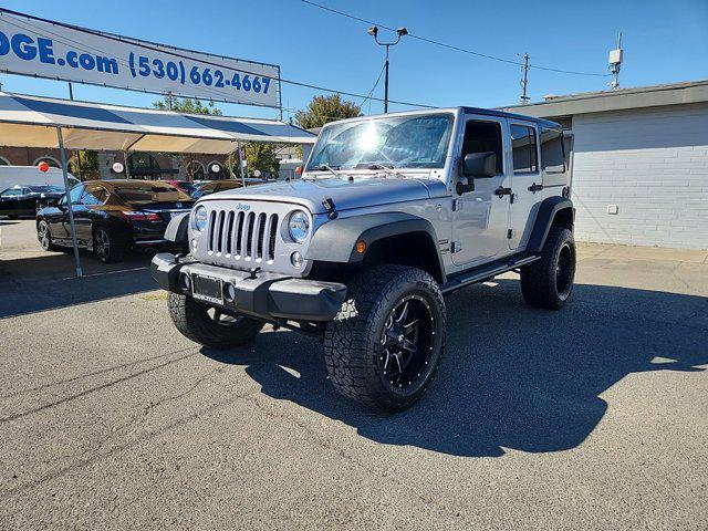 used 2018 Jeep Wrangler JK Unlimited car, priced at $23,998