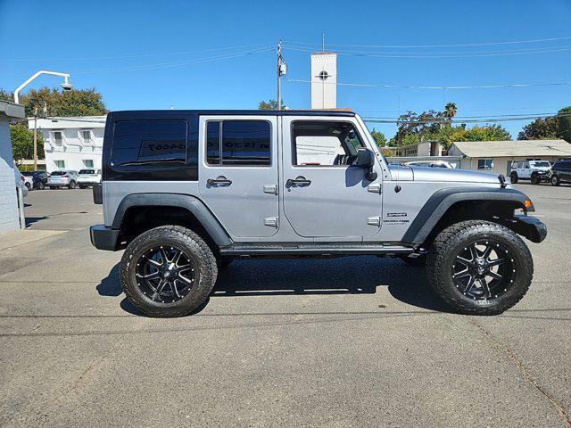 used 2018 Jeep Wrangler JK Unlimited car, priced at $23,998