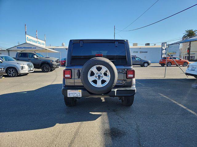 used 2021 Jeep Wrangler Unlimited car, priced at $31,889