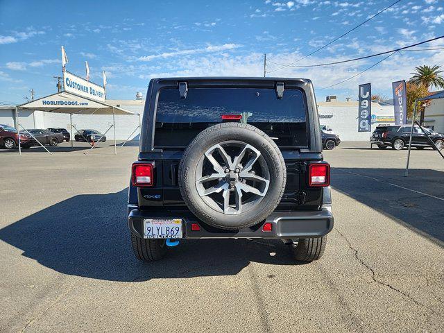 used 2024 Jeep Wrangler 4xe car, priced at $37,996