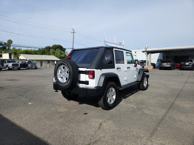 used 2014 Jeep Wrangler Unlimited car, priced at $18,445
