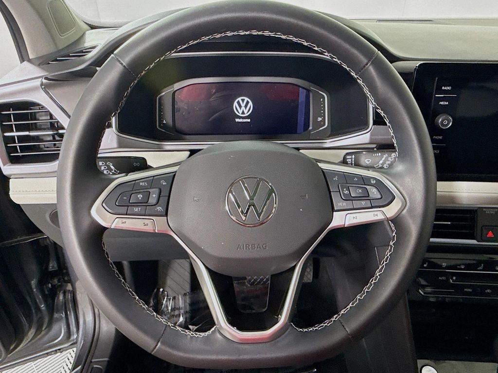 used 2025 Volkswagen Taos car, priced at $31,997