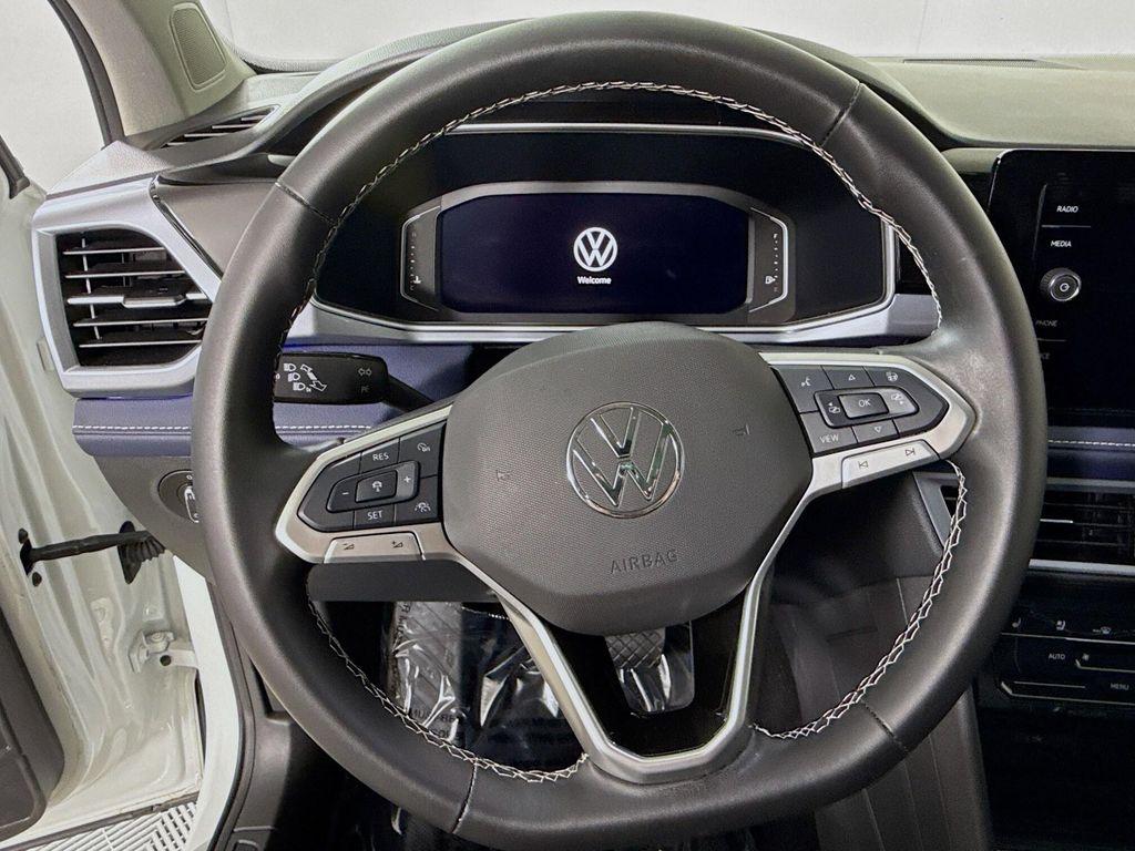 used 2025 Volkswagen Taos car, priced at $30,977