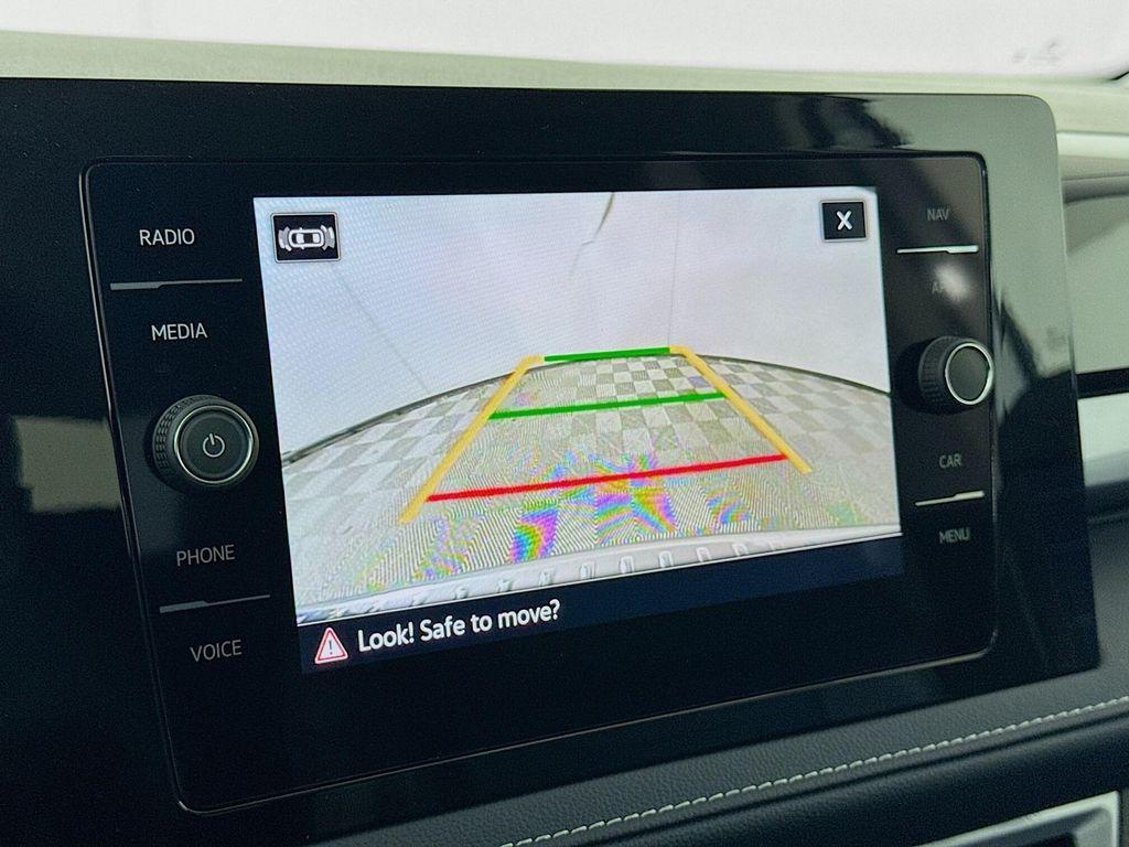 used 2025 Volkswagen Taos car, priced at $30,977