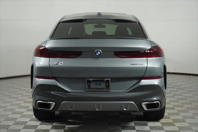 used 2025 BMW X6 car, priced at $76,977