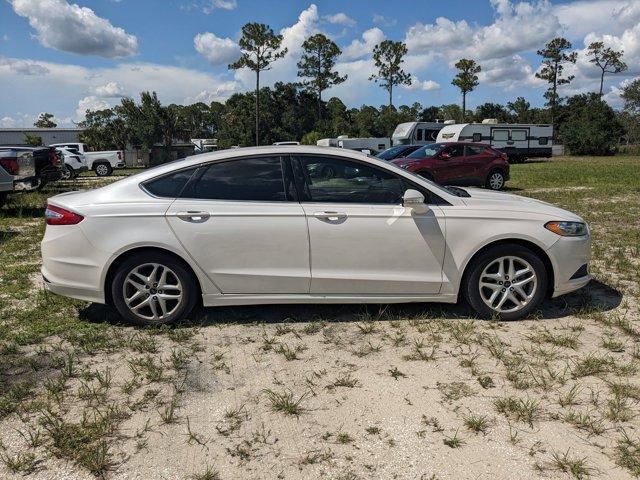 used 2016 Ford Fusion car, priced at $7,984