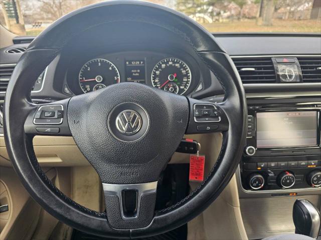 used 2014 Volkswagen Passat car, priced at $11,988